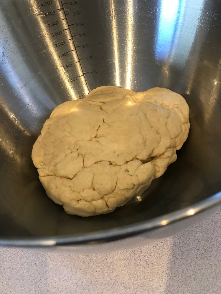 Breadstick dough in stand up mixer after mixing and kneading 
